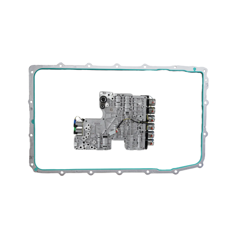 An automotive transmission valve body assembly with a silver metallic body, black hoses, and wiring, positioned centrally on a white background with a faint teal gasket outline.