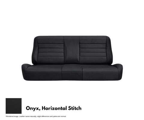 Black leather sofa with vertical stitching on a white background