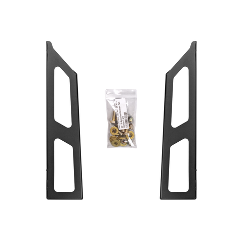Two black metal mounting brackets with angled cutouts, shown side by side with a small clear plastic bag of gold-colored hardware in the center, on a plain white background.