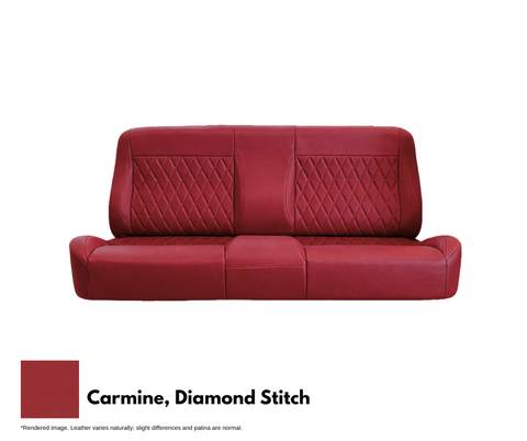 Red leather sofa with diamond stitch pattern on a white background