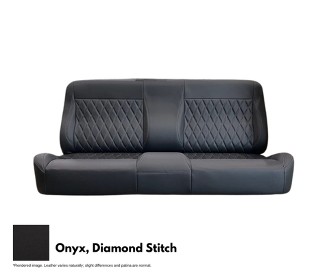 Black leather car seat with diamond stitch pattern on a white background