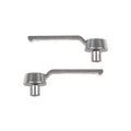 Two metallic door handles on a white background