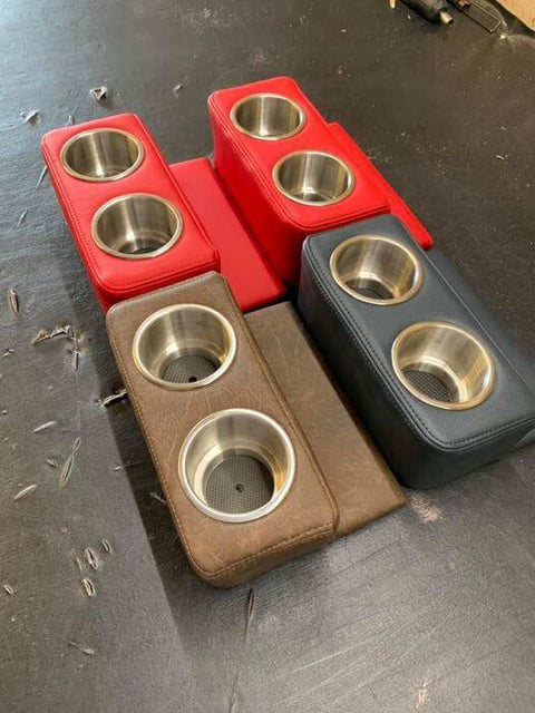 Bench seta cup holder by fat fender on a black distressed surface