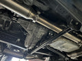 Mount mount kit under vehicle view in a garage setting