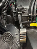 Close-up of a vehicle's interior mechanism with visible branding.