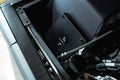 ECU mount with a FFG logo in a matte black engine bay