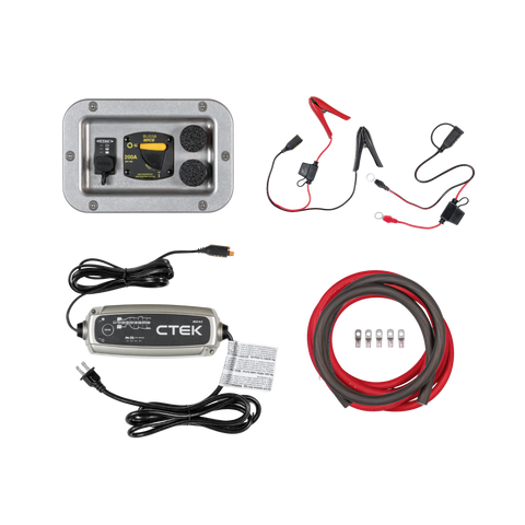 Collection of automotive battery jump starter and charging equipment on a white background