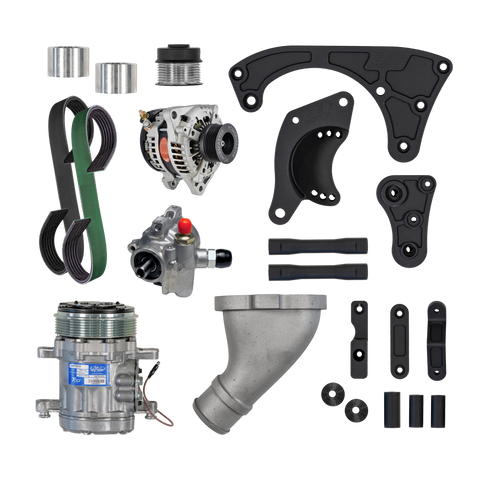A complete automotive parts kit laid out on a white background, including a green and black drive belt, alternator, AC compressor, metal pipe, brackets, and hoses.