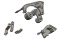 A set of mechanical metal components, including two large roller assemblies and two smaller bracket pieces, shown on a plain white background.