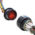 Two wiring connectors with multicolored wires on a white background