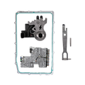 A set of automotive mechanical parts laid out on a white background, including a large gasket with a teal seal, a silver metal assembly, a smaller silver metal component, a small pin, and a black plastic connector.