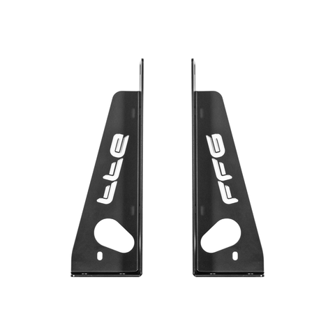 a pair of black transmission cooler mount with the FFG logo laser cut into them