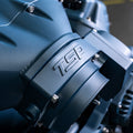 Close-up of the TSP intake and throttle body inlet in Blue Titanium with 10% Black Cerakote on a BluePrint LS engine, by Fat Fender Garage