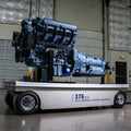 BluePrint 376 LS engine and ZF 8HP70 8-speed transmission in Blue Titanium Cerakote, side profile on a display cart, by Fat Fender Garage
